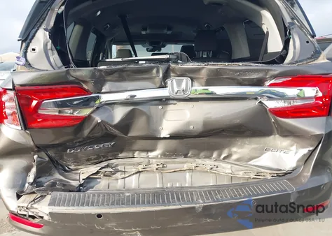 2018 Honda Odyssey Elite z USA, uszkodzony, nr VIN 5FNRL6H99JB032548